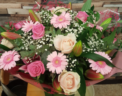 Lilly Rose Handtied - Handtied of pink lillies and roses with gerberas and beautiful foliages
