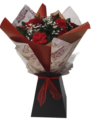 Simply Red - A classic hand-tied bouquet in rich red and crisp white tones, beautifully finished with coordinating red and natural wrapping.