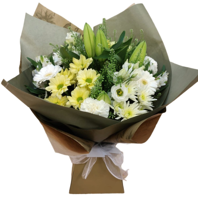 Lemon & White Delight - A fresh and uplifting hand-tied bouquet combining soft lemon and white tones with abundant natural greenery.