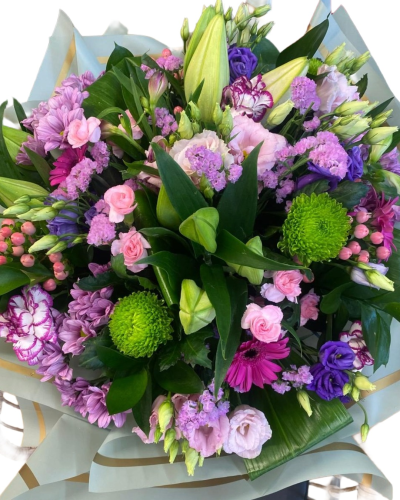 Purple Garden - A luxury hand-tied bouquet bursting with pink, purple and fresh green tones for a colourful and joyful display.