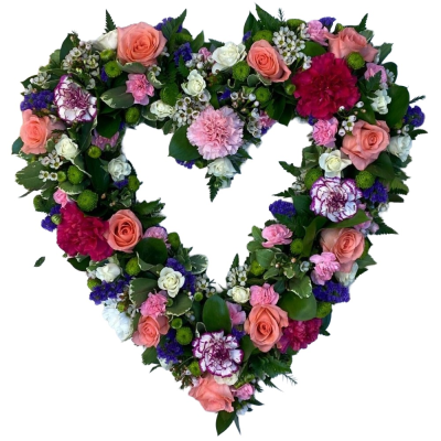 Garden Heart Tribute - A beautiful open heart funeral tribute arranged in soft pink, peach, purple, white and fresh green tones.