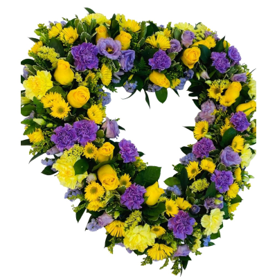 Golden Heart Tribute - A beautiful open heart funeral tribute in vibrant yellow and purple tones, finished with fresh greenery.