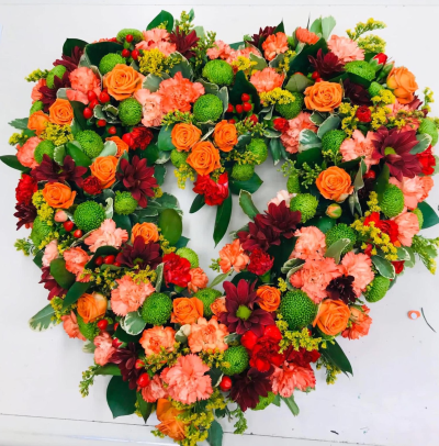 Autumn Glow Heart - A vibrant open heart funeral tribute in warm orange, coral, burgundy and fresh green tones.
