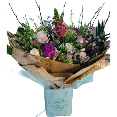 Wild at Heart - A beautiful hand-tied bouquet in soft pink, cerise and purple tones, styled with natural greenery and rustic wrapping.