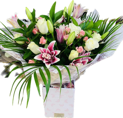 Pink Elegance - A generous hand-tied bouquet in soft pink and creamy white tones, finished with abundant sweeping greenery.