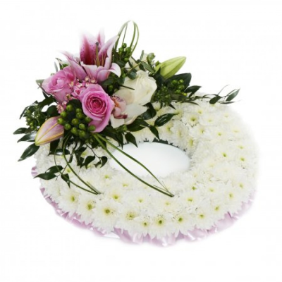 Pink Massed Wreath - At Buttercups and Daisies we are delighted to present this product available for flower delivery in Birmingham and surrounding areas and surrounding areas. Handcrafted by Buttercups & Daisies Florist Birmingham, this Pink Massed Wreath is prepared as a thoughtful floral tribute for a funeral, memorial or remembrance service. Shape, scale, contrasting tones and finishing details are assessed closely to create an appropriate and respectful presentation. Seasonal availability can affect individ...