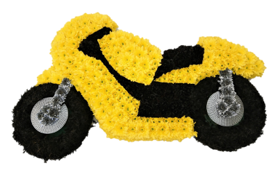 Motorbike Tribute - Pay tribute to their love of motorcycles with this distinctive floral display. Can be made to the customers specification on colours and style and brand. Approximate Width: 78cm/ 31in Length: 46cm/ 18in Designed and made by Buttercups & Daisies Florist Birmingham, this Motorbike Tribute offers families a personal way to express remembrance through flowers. The design is assembled patiently, with suitable blooms and foliage positioned to maintain a clear form and balanced character. Flower va...
