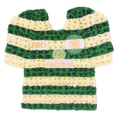 Football Shirt - Pay tribute to your loved ones passion for a football team. Most football shirts can be recreated in flowers, advise the florist in special instructions which team is required. Pictured Celtic shirt. approximate dimensions: 60cm x 60cm / 24in x 24in This Football Shirt is carefully handcrafted in Birmingham for a meaningful farewell, memorial gathering or funeral service. The florists consider proportion, outline, colour balance and texture so the finished design has a dignified, carefully a...