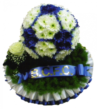 Football Tribute 3D - This tribute is the perfect way to celebrate the deceaseds love of football. A 3D football on a base to look like grass. Item shown in Birmingham city colours but can be created in other football team colours. Approximate dimensions: 30cm x 25cm / 12in x 10in Handcrafted by Buttercups & Daisies Florist Birmingham, this Football Tribute 3D is prepared as a thoughtful floral tribute for a funeral, memorial or remembrance service. Shape, scale, contrasting tones and finishing details are assess...