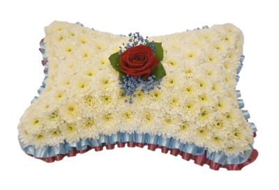 Pillow (Simple) - This pillow-shaped design is massed in white double chrysanthemums and complemented with a single flower. Ribbon colour and single flower colour can be changed to suit customers choice. Please advise in special instructions. This design comes in 3 sizes approx: standard 15in, deluxe 18in, luxury 21in. Our experienced Birmingham florists create this Pillow (Simple) with a respectful finish suitable for a funeral, commemoration or celebration of life. Every section is constructed with attentio...