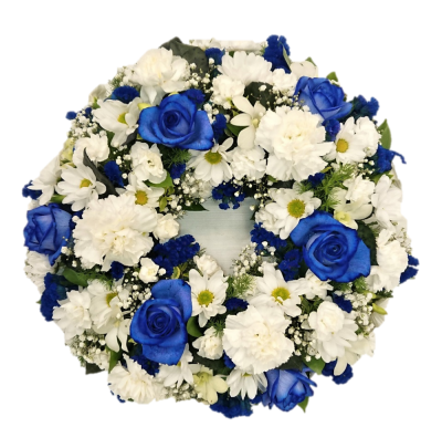 Wreath - Blue and white - Wreath - Blue and white This love ly wreath in a selection of dyed and sprayed blue and white flowers is suitable for any funeral but especially for a boy or male funeral. The blue roses in this item may need to be substituted when they are not available. The blue roses can be ordered if at least 3 working days notice is given please advise in special instructions if they are required.10 £65 / 12£85 / 14 £105 This Wreath - Blue and white is carefully handcrafted in Birmingham for a meanin...