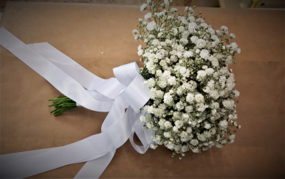 Gypsophila Wedding Posy - Gypsophila Bridesmaid posy tied with white satin ribbon Designed with wedding styling in mind, this Gypsophila Wedding posy is arranged locally in Birmingham with careful attention to presentation. The team considers venue style, photography, seasonal colour and surrounding décor when discussing a coordinated design. Because fresh flowers naturally change through the year, particular varieties may be substituted with comparable choices that retain the intended palette and shape. A consultat...