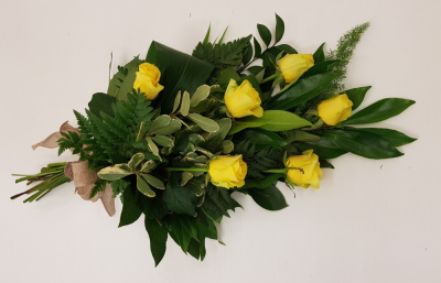 Simple Rose Sheaf - Large-headed roses are presented with aralia leaves, French ruscus and eucalyptus to create this simple, classic rose sheaf. Approximate product dimensions: Length: 60cm. Width: 34cm. Six stems Our experienced Birmingham florists create this Simple Rose Sheaf with a respectful finish suitable for a funeral, commemoration or celebration of life. Every section is constructed with attention to symmetry, visual depth and neat edging, helping the tribute look considered from different viewpoints....