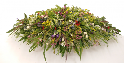 Wild garden casket spray - Wild garden casket spray Handcrafted by Buttercups & Daisies Florist Birmingham, this Wild garden casket spray is prepared as a thoughtful floral tribute for a funeral, memorial or remembrance service. Shape, scale, contrasting tones and finishing details are assessed closely to create an appropriate and respectful presentation. Seasonal availability can affect individual stems, but the florist will protect the designs principal colours, proportions and overall feeling wherever possible. Bes...