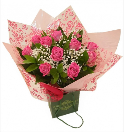 Heavenly Pink Rose Hand-tied - A dozen of the finest pink roses beautifully arranged by our florists in a hand-tied bouquet with foliage and gypsophila. A perfect gift for any occasion but especially for Mothers Day. Standard: 12 Pink Roses. Deluxe: 18 Pink Roses. Luxury: 24 Pink Roses Made by an experienced Birmingham florist, this Heavenly Pink Rose Hand-tied offers a personal alternative to a generic postal flower delivery. Complementary flowers and foliage are selected to give the arrangement attractive movement, dept...