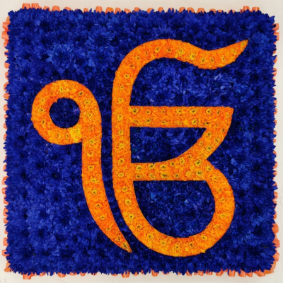 Ek Onkar Funeral Tribute - Ek Onkar the Sikh religious symbol is created using a 2 foot x 2 foot designer board and dyed double chrysanthemums, by our skilled florists at Buttercups & Daisies Florist Birmingham Our experienced Birmingham florists create this Ek Onkar Funeral Tribute with a respectful finish suitable for a funeral, commemoration or celebration of life. Every section is constructed with attention to symmetry, visual depth and neat edging, helping the tribute look considered from different viewpoints. Fr...