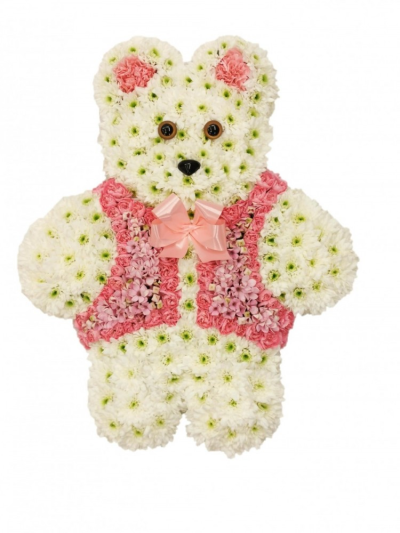 Teddy Bear (Girl) - This teddy bear tribute is in pink shades to suit a girl annd stands approx 19in / 48cm Our experienced Birmingham florists create this Teddy Bear (Girl) with a respectful finish suitable for a funeral, commemoration or celebration of life. Every section is constructed with attention to symmetry, visual depth and neat edging, helping the tribute look considered from different viewpoints. Fresh materials are selected according to quality and supply, with thoughtful alternatives used when nece...