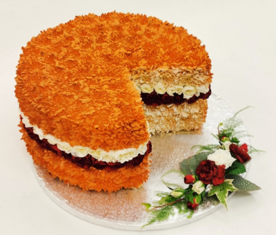 Victoria Sponge Cake Funeral Tribute - This cake-shaped funeral tribute is created by our skilful florists using chrysanthemums and spray carnations with a spray of flowers. Our experienced Birmingham florists create this Victoria Sponge Cake Funeral Tribute with a respectful finish suitable for a funeral, commemoration or celebration of life. Every section is constructed with attention to symmetry, visual depth and neat edging, helping the tribute look considered from different viewpoints. Fresh materials are selected according ...