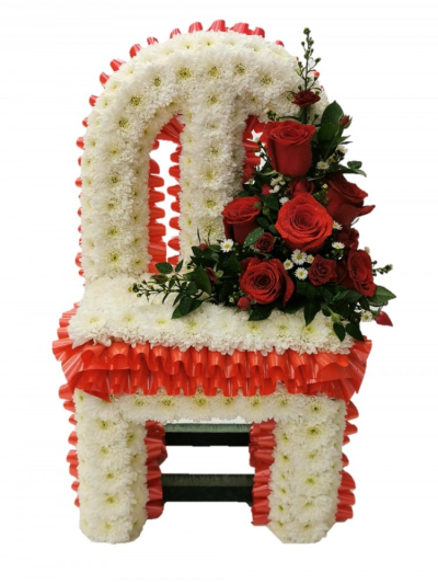 Vacant Chair - This vacant chair funeral tribute is shown with red ribbon and a red rose spray with white chrysanthemums. Colours can be changed to personalise this tribute. contact the florist or enter in the special instructions Designed and made by Buttercups & Daisies Florist Birmingham, this Vacant Chair offers families a personal way to express remembrance through flowers. The design is assembled patiently, with suitable blooms and foliage positioned to maintain a clear form and balanced character. F...