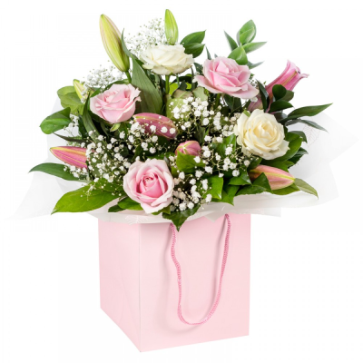 Strawberries & Cream - A beautiful collection of roses and lilies hand-tied and delivered in a gift bag or box. Our local Birmingham florists prepare this Strawberries & Cream with careful colour balance, texture and presentation for a polished finish. Each design is made to order, presented neatly and prepared with the recipient and occasion in mind. Fresh materials are selected according to quality and supply, with thoughtful alternatives used when necessary to maintain the pictured character. Customers can incl...