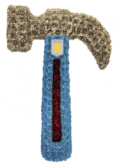 Hammer (Aston Villa) - Hammer funeral tribute for a villa fan Designed and made by Buttercups & Daisies Florist Birmingham, this Hammer (Aston Villa) offers families a personal way to express remembrance through flowers. The design is assembled patiently, with suitable blooms and foliage positioned to maintain a clear form and balanced character. Flower varieties and foliage depend on seasonal supply; suitable substitutions may therefore be used while preserving the overall style, value and colour character shown....