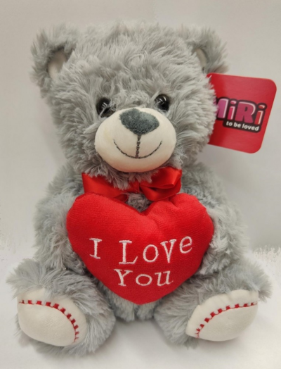 I love you teddy - This soft grey teddy bear with an I love you heart is approx 10in/25cm high Made by an experienced Birmingham florist, this I love you teddy offers a personal alternative to a generic postal flower delivery. Complementary flowers and foliage are selected to give the arrangement attractive movement, depth and a well-finished presentation. Because fresh flowers naturally change through the year, particular varieties may be substituted with comparable choices that retain the intended palette an...