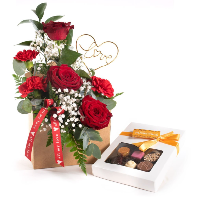 Love Letter with Chocs - Send a message straight from your heart with this delightful envelope arrangement of romantic flowers accompanied by delicious chocolates. Made by an experienced Birmingham florist, this Love Letter with Chocs offers a personal alternative to a generic postal flower delivery. Complementary flowers and foliage are selected to give the arrangement attractive movement, depth and a well-finished presentation. Because fresh flowers naturally change through the year, particular varieties may be su...