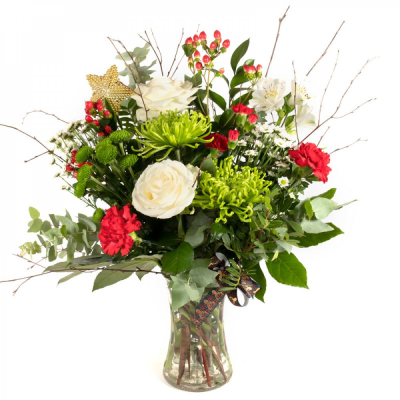 Under the Mistletoe - This luxurious vase arrangement centred around opulent red roses is the perfect focal point for any home this Christmas. Made by an experienced Birmingham florist, this Under the Mistletoe offers a personal alternative to a generic postal flower delivery. Complementary flowers and foliage are selected to give the arrangement attractive movement, depth and a well-finished presentation. Because fresh flowers naturally change through the year, particular varieties may be substituted with compar...