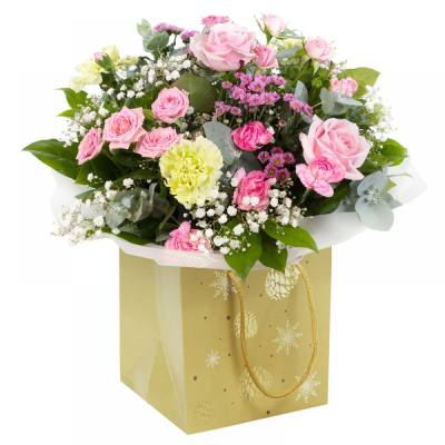 Holiday Cheer - Make one to remember with this bright and vibrant collection of flowers, beautifully presented in a gift box / bag. This Holiday Cheer is arranged by Buttercups & Daisies Florist Birmingham for birthdays, anniversaries, celebrations and caring messages. Careful conditioning, placement and wrapping help the flowers arrive looking fresh, coordinated and ready to enjoy. Flower varieties and foliage depend on seasonal supply; suitable substitutions may therefore be used while preserving the over...
