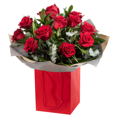 12 Red Roses - Make a classic romantic statement with our luxury bouquet of 12 premium red roses, beautifully hand-tied with seasonal foliage and gift wrapped for a stunning finish. Whether youre surprising a partner, celebrating an anniversary, or sending a heartfelt Valentines Day gift, this red rose arrangement is the perfect choice for a timeless gesture of love. At Buttercups & Daisies Florist Birmingham, we prepare every bouquet fresh to order using high-quality roses for maximum colour, fragrance, a...