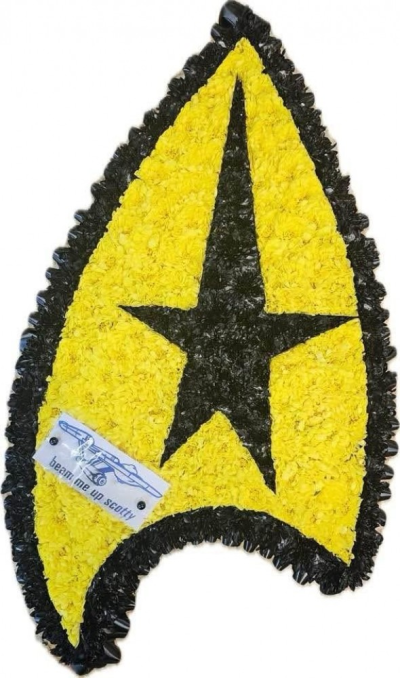Star Trek Badge Tribute - Sci-Fi Badge Tribute is a bespoke funeral flower design for remembering someone with a love of classic science fiction, space adventures or imaginative fandom.