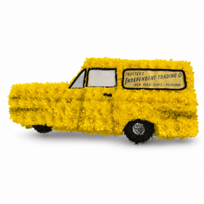 Only Fools & Horses Van - Yellow Trading Van is a bespoke vehicle-shaped funeral flower tribute inspired by a much-loved comedy-style three-wheeled van.