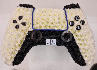 Gaming Controller Tribute - Gaming Controller Tribute is a bespoke funeral flower design created for remembering someone whose favourite pastime was video gaming.